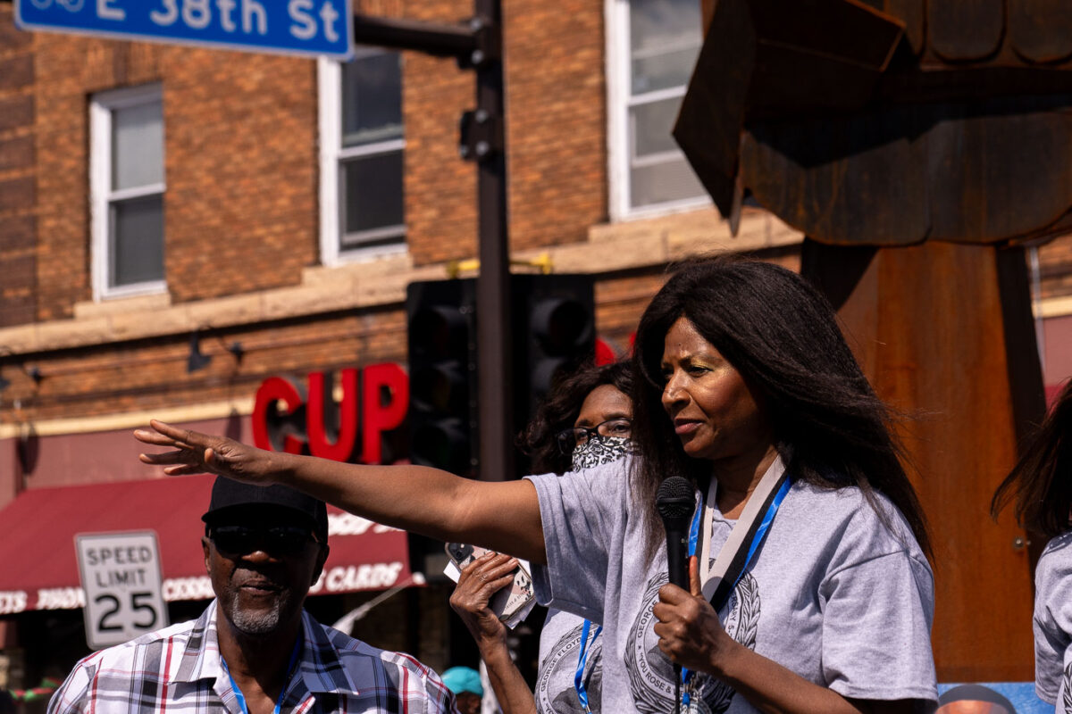 George Floyd’s aunt Angela Harrelson speaks to the crowd at George Floyd Square on the 1-year anniversary of his murder.