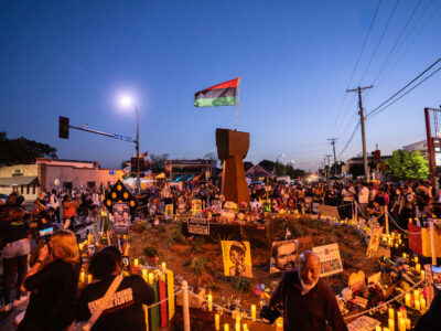 Candles around the fist at George Floyd Square