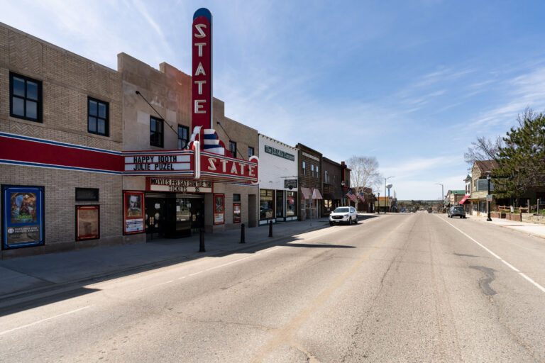 Ely State Theater, Ely, Minnesota 1 Ely State Theater on E Sheridan St. in Ely, Minnesota, with a marquee and downtown storefronts.