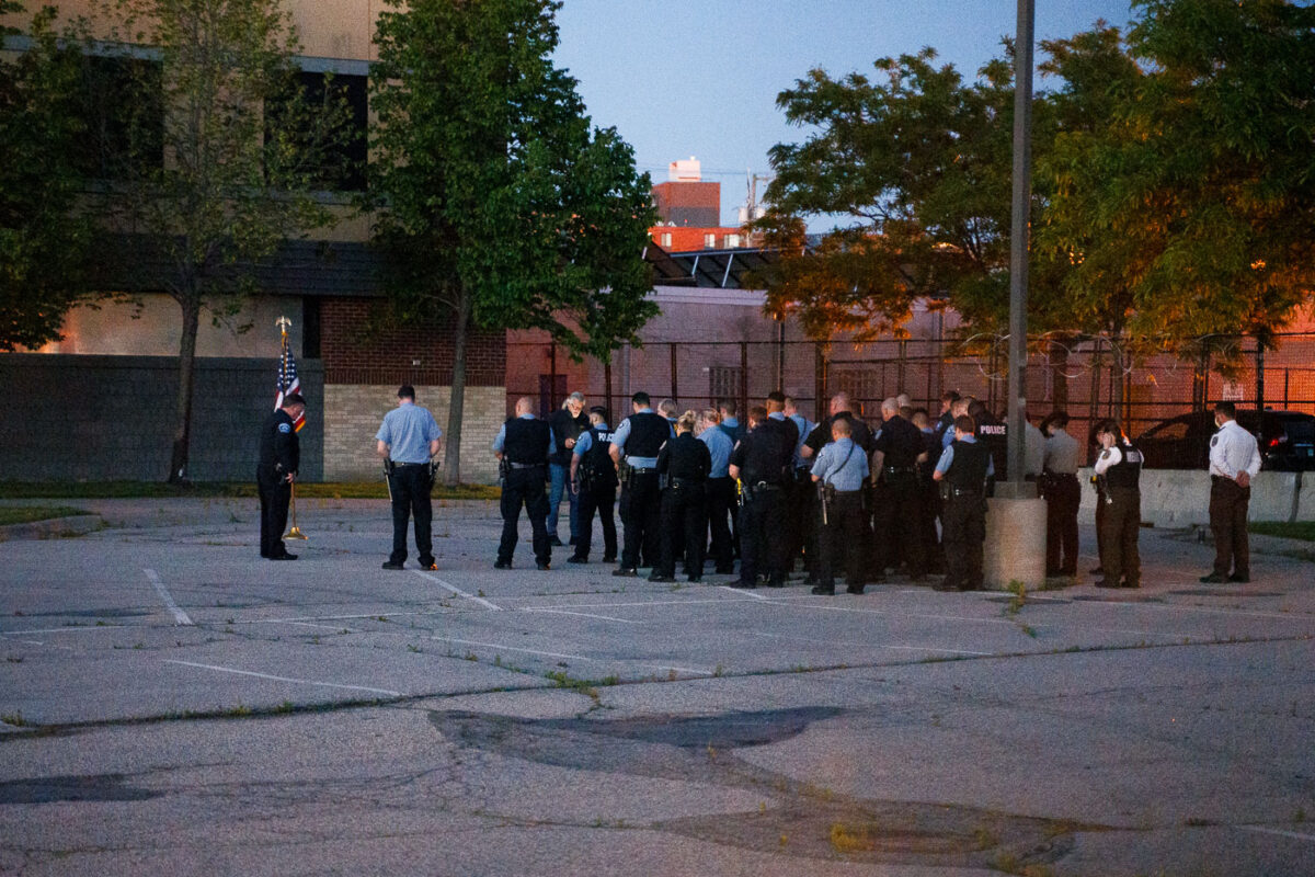 Police officers gather at the Third Precinct on the 1 year anniversary of the burning of the precinct. The Minneapolis Police announced over the radio the precinct had been compromised at 10:14pm on May 28th, 2020.