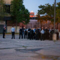 Police officers gather at the Third Precinct on the 1 year anniversary of the burning of the precinct. The Minneapolis Police announced over the radio the precinct had been compromised at 10:14pm on May 28th, 2020.