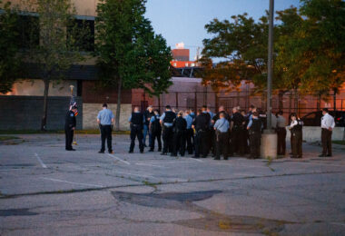 Police officers gather at the Third Precinct on the 1 year anniversary of the burning of the precinct. The Minneapolis Police announced over the radio the precinct had been compromised at 10:14pm on May 28th, 2020.