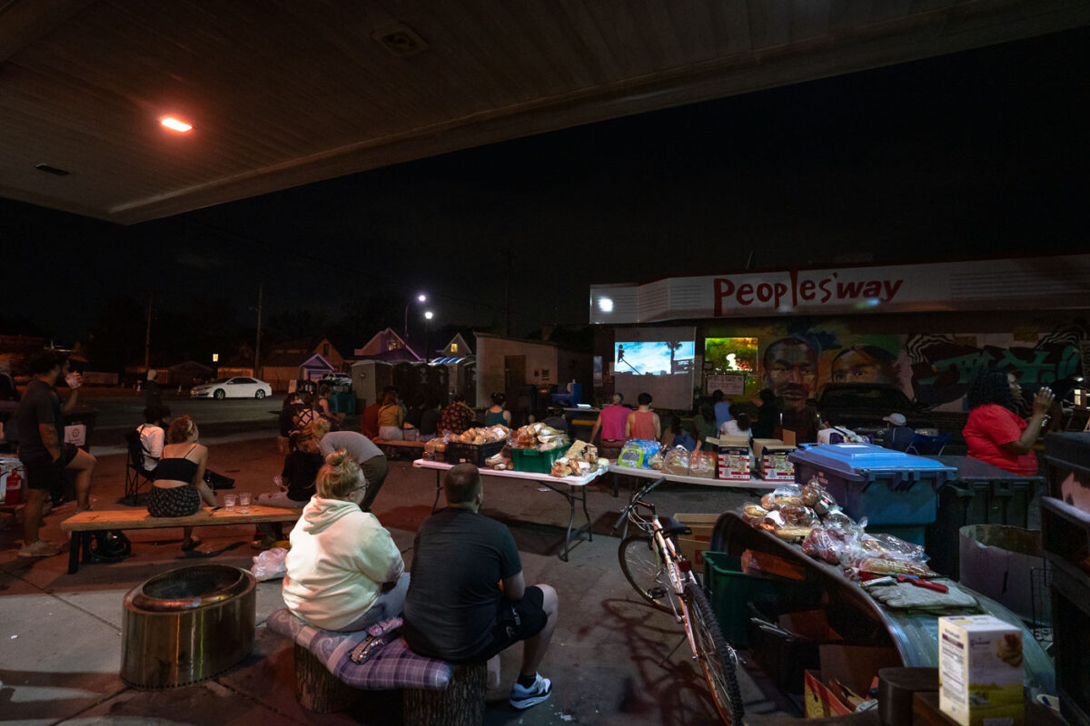 The community gathers to watch a screening of the movie "Mayor" at The People's Way at George Floyd Square.