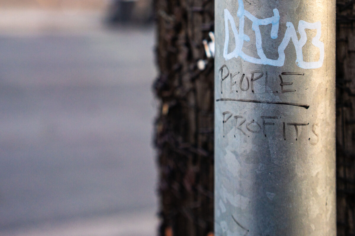 People over profit graffiti in Minneapolis