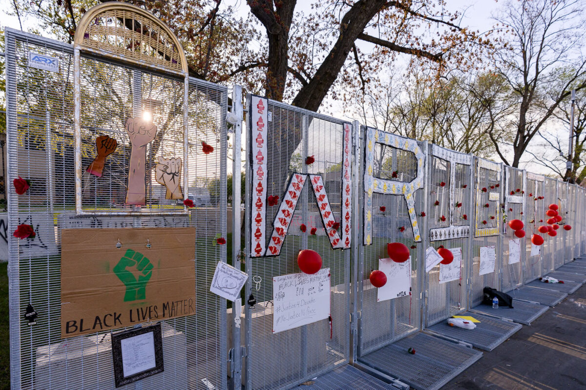 Protest signs around Brooklyn Center police station