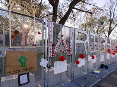Brooklyn Center Police Station Fencing with Protest Signs