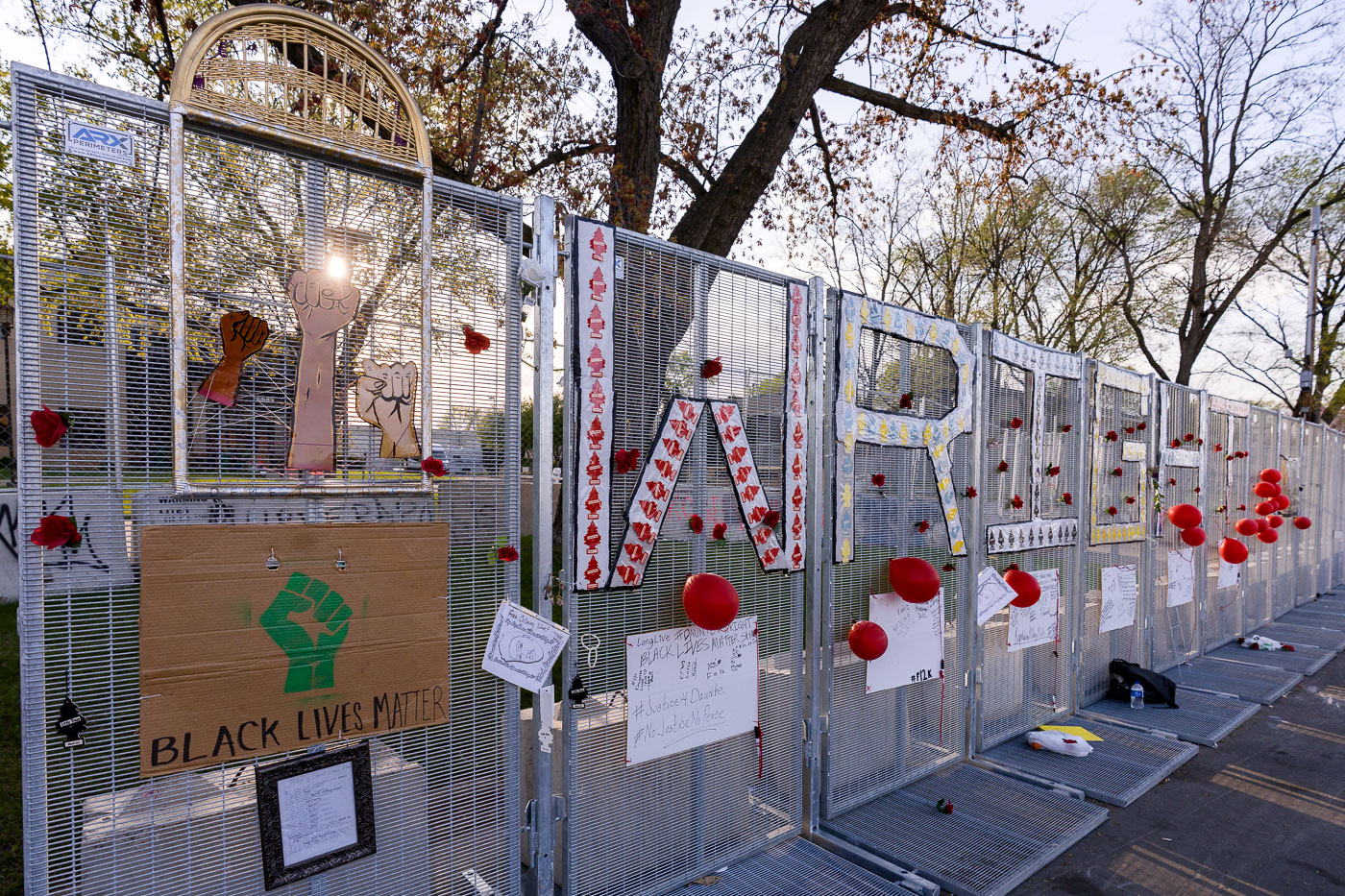 Protest signs around Brooklyn Center police station