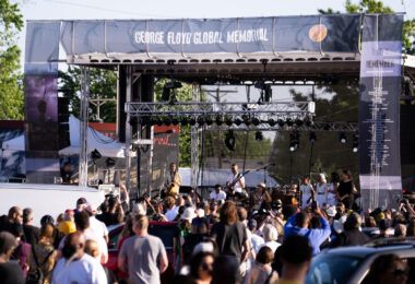 Performers on stage at George Floyd Square on the 1 year anniversary of Floyd's murder.