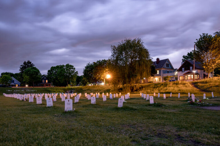 Say Their Names Cemetery in Minneapolis at dusk 3 The Say Their Names Cemetery, located a block from George Floyd Square, on the night before the 1-year anniversary of the murder of George Floyd.