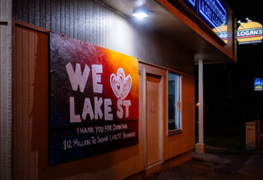 A board thanking the public for donating to rebuild efforts.