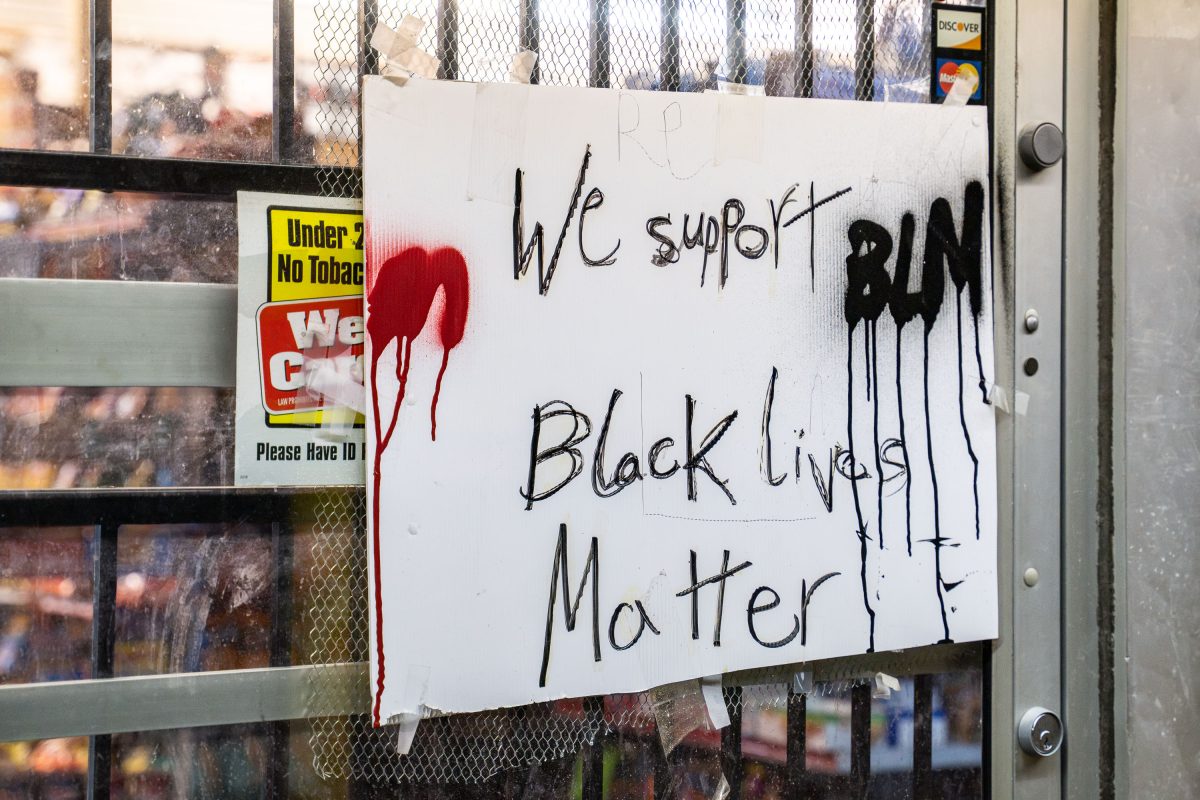 “We Support BLM” Sign on Corner Store Security Gate, Minneapolis
