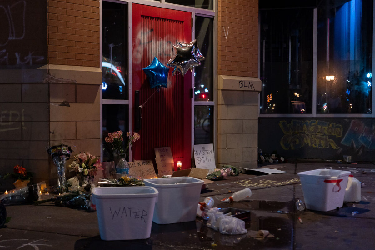 A memorial for Winston Smith on Lake Street. Smith was killed on June 3rd by a Federal task force on top of a nearby parking ramp.