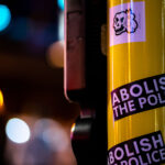 Abolish The Police sticker on an street pole in Uptown Minneapolis.