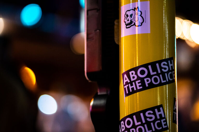 Abolish the police stickers in Uptown Minneapolis 2 Abolish The Police sticker on an street pole in Uptown Minneapolis.