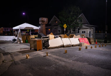 Street barricades at Columbus and 38th Street in South Minneapolis. The barricades are at the edge of George Floyd Square. They replace barricades the city removed days earlier in an attempt to open up the area to vehicular traffic.