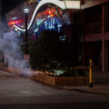 Bushes burn on Girard Avenue during protests over the law enforcement shooting death of Winston Smith on June 3rd.