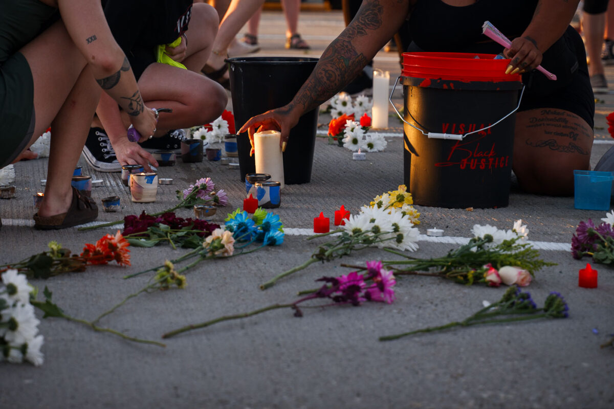 Candles being lit at a vigil for Winston Smith who was shot and killed by law enforcement on June 4th, 2021.

The vigil was held at the tiop of the parking ramo where he was shot and killed the day earlier by a Federal task force.