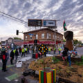 City employees move in to open George Floyd Square to vehicle traffic. The early morning activity took place almost a year after the area was closed after the murder of George Floyd.