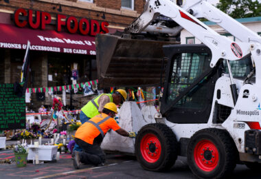 City employees place concrete barricades around the location of George Floyd's murder. The area inside George Floyd Square has been a protest zone since his murder by the Minneapolis Police.
