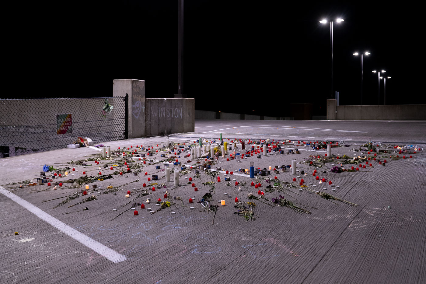 Flowers and candles where Winston Smith was killed