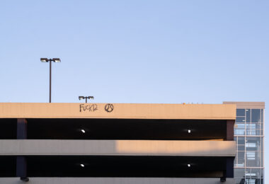 "Fuck 12" written on top of the Seven Points parking ramp. 

Winston Smith was killed on the top floor on June 3rd by a Federal Task Force.