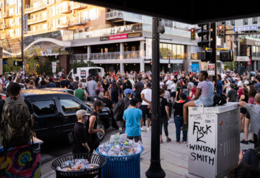Protesters speak at the corner of Lake and Girard after marching through Uptown Minneapolis.

Winston Smith was killed by law enforcement on June 3rd and Deona Marie was killed when a man drove a vehicle through protesters barricades.