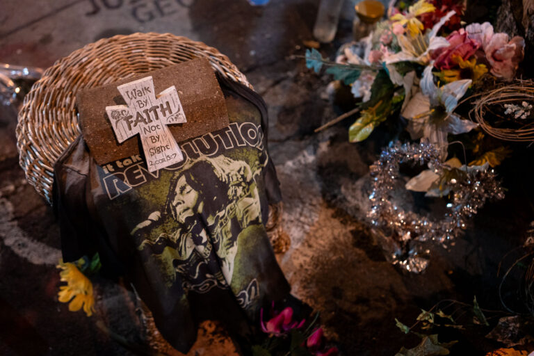 It Takes a Revolution sign at George Floyd Square 1 A t-shirt and sign placed at the George Floyd Memorial at George Floyd Square in Minneapolis.