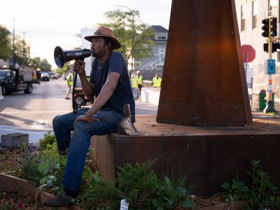 Jay Webb speaks at George Floyd Square garden, Minneapolis