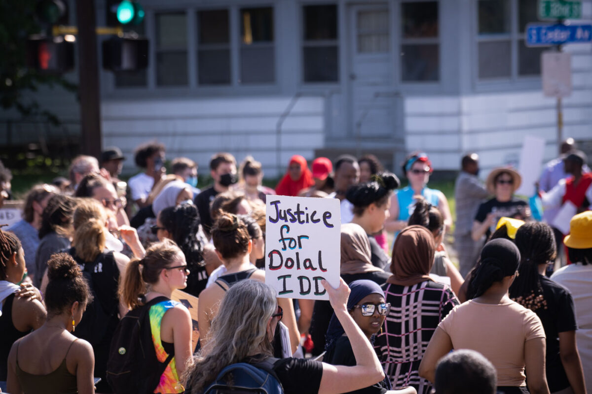 Protesters march from the location of where Dolal Idd was killed 6 months earlier by Minneapolis Police. Protesters are seeking answers to the shooting.