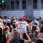 Protesters march from the location of where Dolal Idd was killed 6 months earlier by Minneapolis Police. Protesters are seeking answers to the shooting.