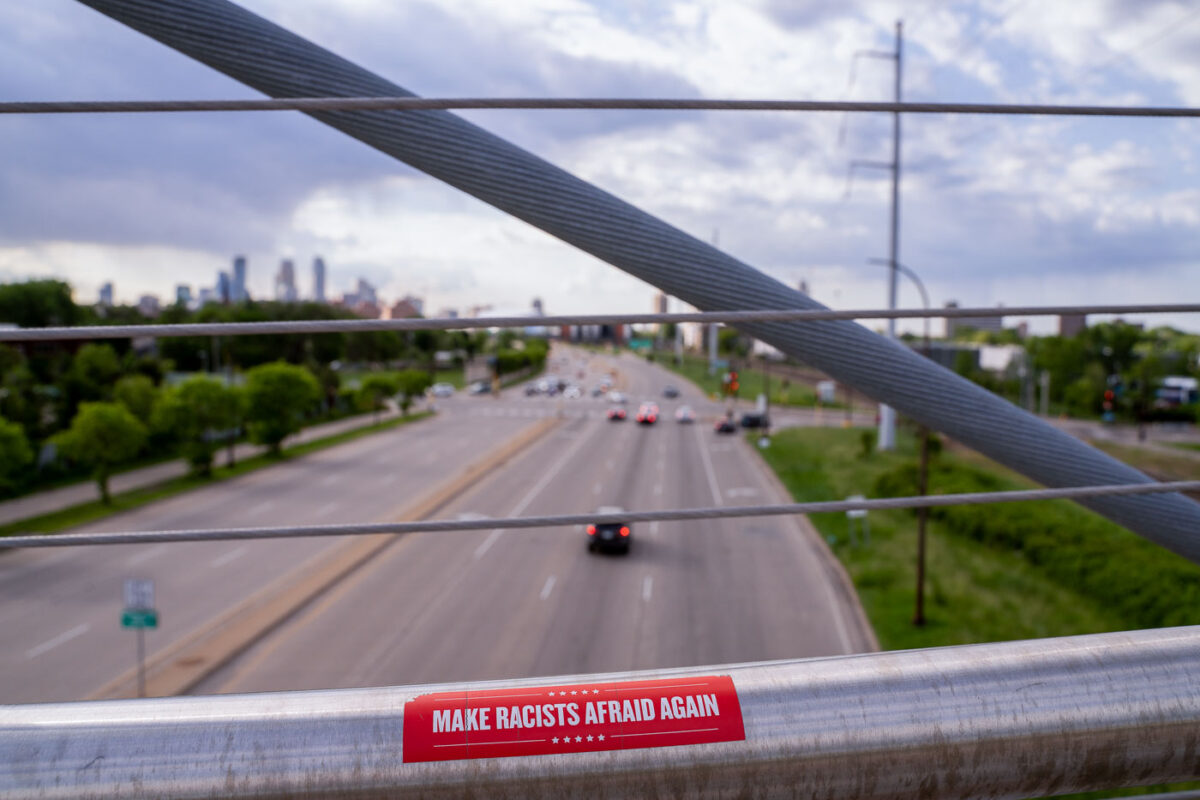 A sticker on the Martin Olav Sabo bridge in Minneapolis that reads "Make Racists Afraid Again".