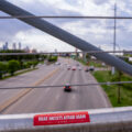 A sticker on the Martin Olav Sabo bridge in Minneapolis that reads "Make Racists Afraid Again".