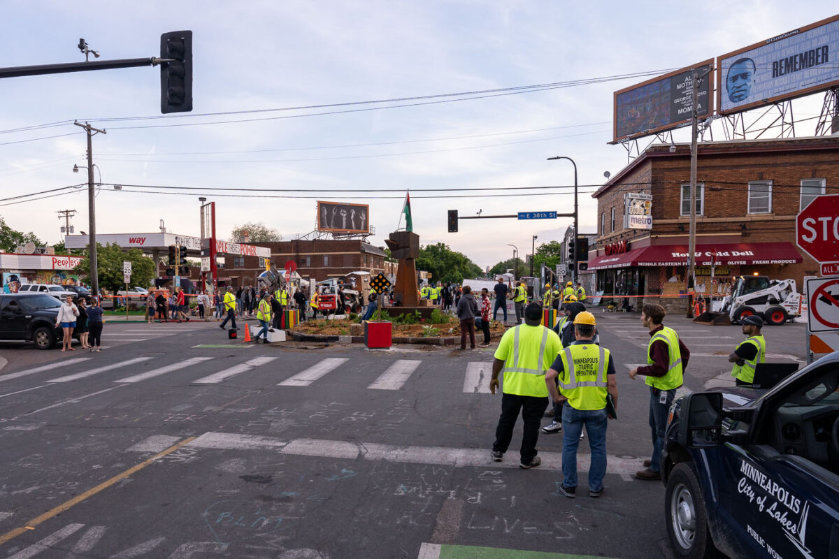 Minneapolis city workers cordinate to remove street barricades around George Floyd Square. The square has been a protest zone since the murder of George Floyd.