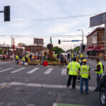 Minneapolis city workers coordinate to remove street barricades around George Floyd Square. The square has been a protest zone since the murder of George Floyd.