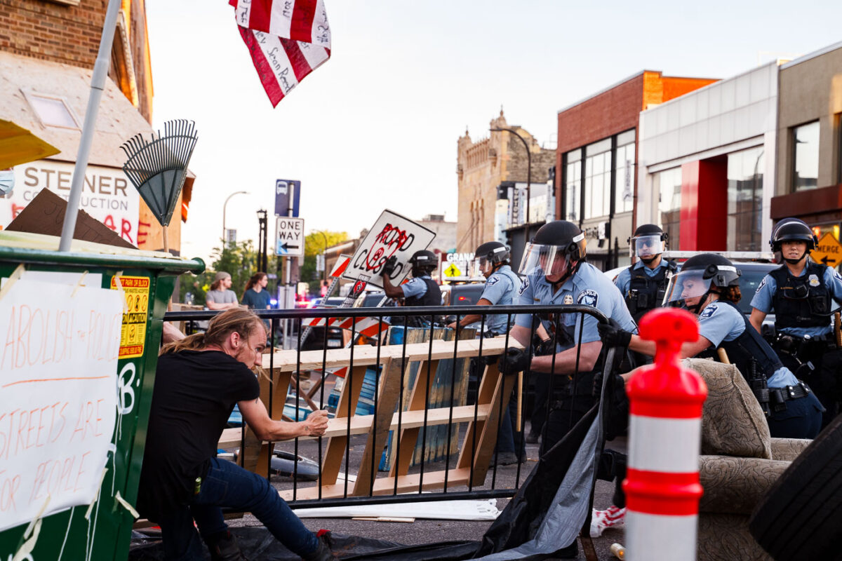 Minneapolis Police clash with protesters at Lake Street and Hennepin Ave while attempting to remove street barricades.

Protesters had barricaded the streets following the June 3rd Federal Task Force killing of Winston Smith and June 13th killing of Deona Marie.

Marie was killed when Nicholas Kraus drove his vehicle into those protesting the killing of Smith.