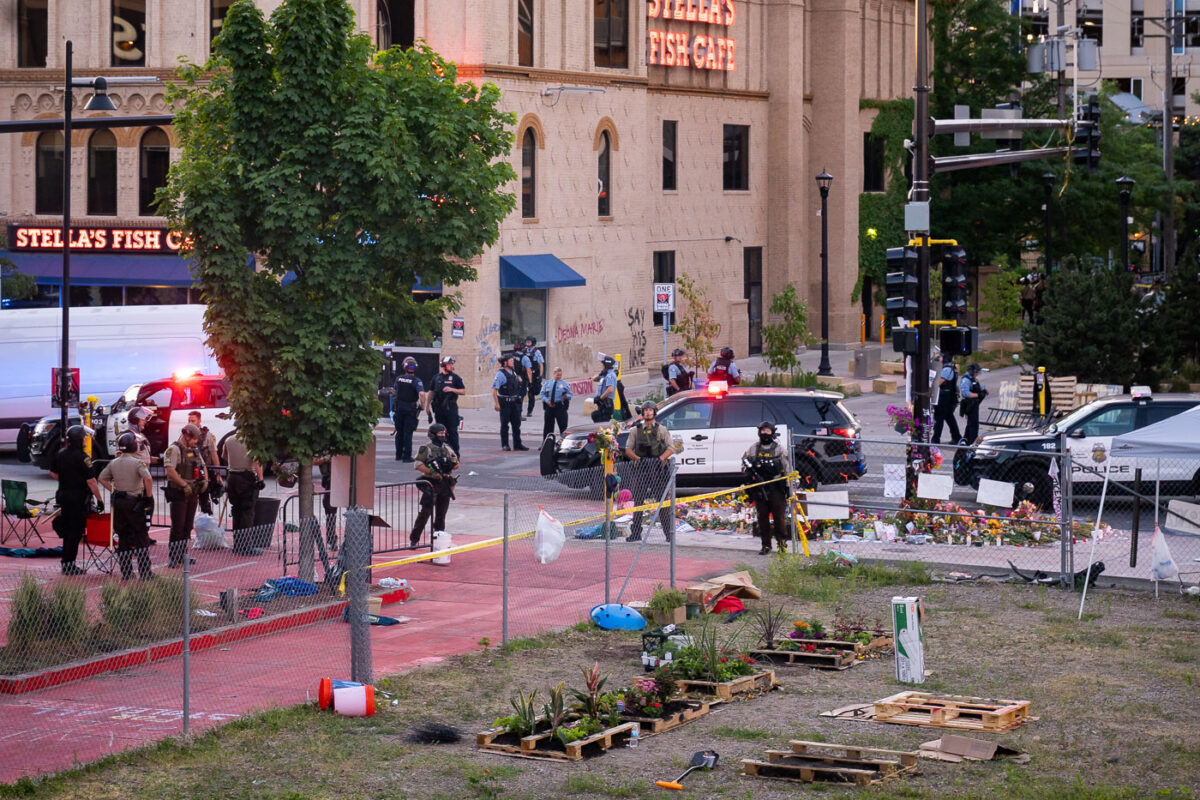 Law enforcement from multiple agencies respond to protesters who had been gathered since June 3rd protesting the killing of Winston Smith and the June 13th killing of Deona Marie.

Winston Smith was killed after Hennepin and Ramsey County officers fired their weapons while part of a Federal Task Force serving a warrant. 

Deona Marie was killed when Nicholas Kraus drove his vehicle into those protesting the killing of Smith.