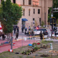 Law enforcement from multiple agencies respond to protesters who had been gathered since June 3rd protesting the killing of Winston Smith and the June 13th killing of Deona Marie.

Winston Smith was killed after Hennepin and Ramsey County officers fired their weapons while part of a Federal Task Force serving a warrant. 

Deona Marie was killed when Nicholas Kraus drove his vehicle into those protesting the killing of Smith.