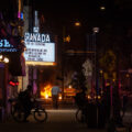 Minneapolis Police on Hennepin Avenue while fires burn in the streets following the June 3rd shooting death of Winston Smith by Federal law enforcement.