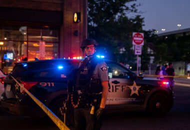Minneapolis Police officer on Hennepin Avenue while they clear our protests that followed the June 3rd and June 13th killings of Winston Smith and Deona Marie.

Winston Smith was killed after Hennepin and Ramsey County officers fired their weapons while part of a Federal Task Force serving a warrant. 

Deona Marie was killed when Nicholas Kraus drove his vehicle into those protesting the killing of Smith.