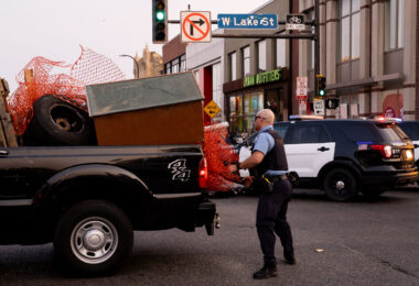 Minneapolis police load up a pickup with materials being used by protesters for barricades. Protesters have been holding space following the June 3rd and June 13th deaths of Winston Smith and Deona Marie.

Winston Smith was killed after Hennepin and Ramsey County officers fired their weapons while part of a Federal Task Force serving a warrant. 

Deona Marie was killed when Nicholas Kraus drove his vehicle into those protesting the killing of Smith.