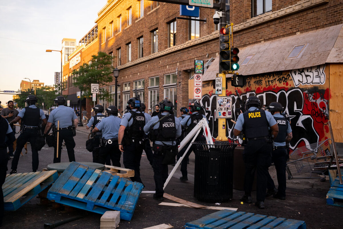 Minneapolis Police move in to dismantle protest barricades and move out protesters who had been gathered protesting the June 3rd killing of Winston Smith and June 13th killing of Deona Marie.

Winston Smith was killed after Hennepin and Ramsey County officers fired their weapons while part of a Federal Task Force serving a warrant. 

Deona Marie was killed when Nicholas Kraus drove his vehicle into those protesting the killing of Smith.