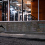 The names of others effected by police violence written on the top of the parking ramp where Winston Smith was killed by law enforcement days earlier.