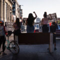 Protesters holding up Black Lives Matter signs on Lake Street at Hennepin Avenue with barricades in place. Protesters have been protesting the June 3rd law enforcement killing of Winston Smith and the June 13th killing of Deona Marie.

Marie was killed when Nicholas Kraus drove his vehicle into those protesting the killing of Smith.