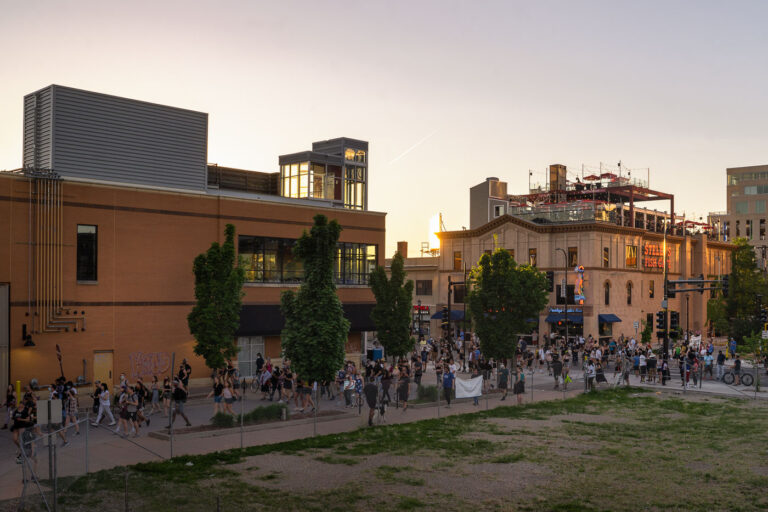 Protesters march through Uptown after Winston Smith is killed 2 Protesters march to the top of the parking ramp where a federal task force shot and killed Winston Smith the day before.