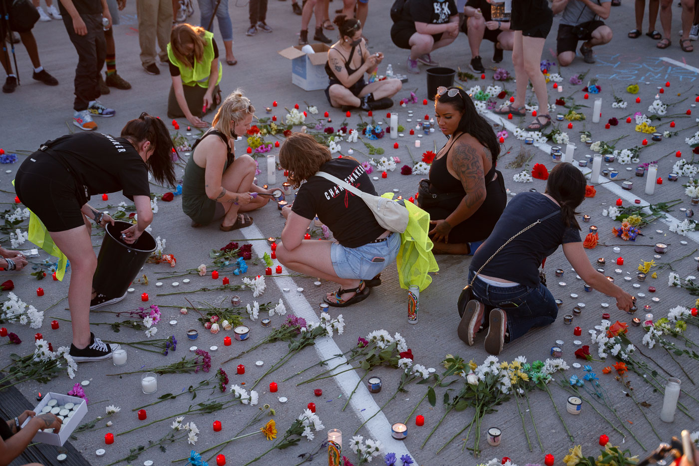 Protesters with candles at Winston Smith vigil