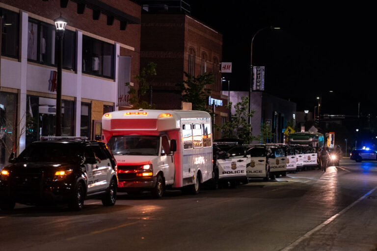 Squad cars line Hennepin Ave in Uptown Minneapolis 2 Minneapolis police park on Hennepin Avenue in Uptown Minneapolis. Police have been responding to protesters who have been gathered in the area following the law enforcement shooting death of Winston Smith.