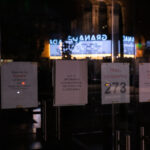 Signs on H&M after Winston Smith was killed by law enforcement the day before a block away. Stores closed early over potential unrest in the area.