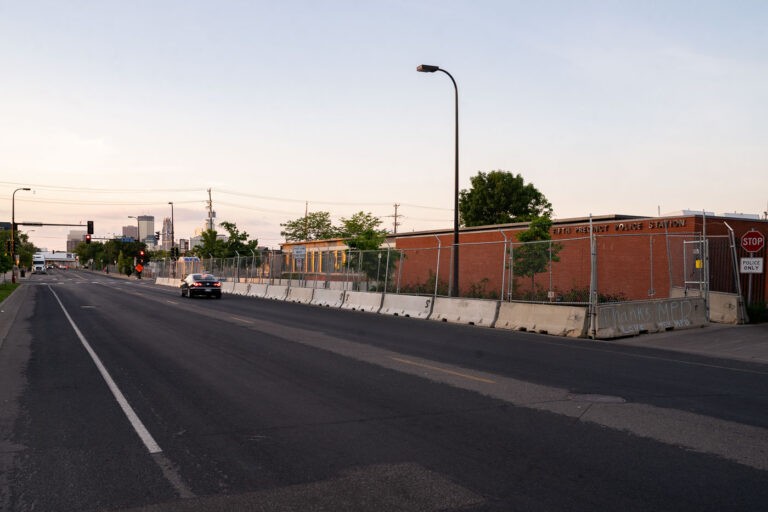 Thanks MPD Love you MPD chalk on police station 3 "Thanks MPD, Love you MPD" written in chalk on concrete barriers surrounding the Minneapolis police fifth precinct police station.The station has been fortified since the Derek Chauvin murder trial.