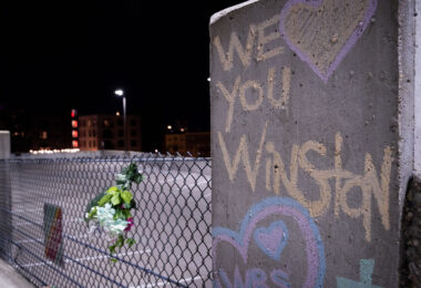 "We love you Winston" written on a pillar next to where Winston Smith was shot and killed by law enforcement on June 3rd, 2021.