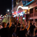 Protesters hold their firsts up during a march in Uptown Minneapolis on the third day of protests following the law enforcement shooting death of Winston Smith on June 3rd.